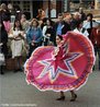 Mulher danando com o vestido tradicional de Jalisco, um dos 31 estados do Mxico. <br> <br> Palavras-chave: dana, Jalisco, Mxico. 