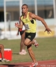 Atleta Rogério da Silva Bispo participando da modalidade salto em distância. <br><br> Palavras-chave: esporte, atletismo, salto em distância.